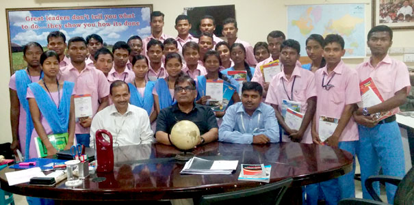 Prof. S.N. Misra, Director, SLD presenting preparatory books on Civil Services to Students of Kalinga Institute of Social Sciences (KISS).